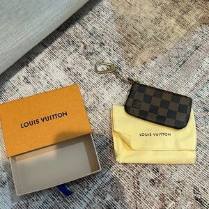 Louis Vuitton keychain wallet.